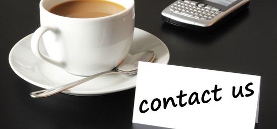 contact us and coffee cup showing business support concept